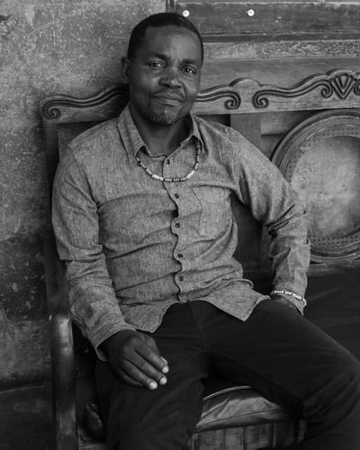 Kennedy Mwashusha, portrait in black and white