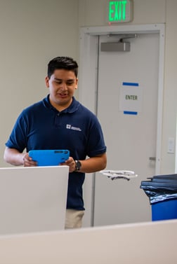 An ASP student flies a drone.