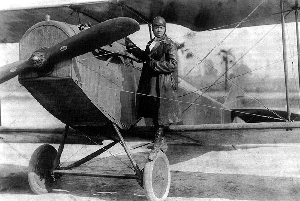 Featured image: Bessie Coleman and her plane. - Read full post: Bessie Coleman: Daredevil, Pioneer, Advocate