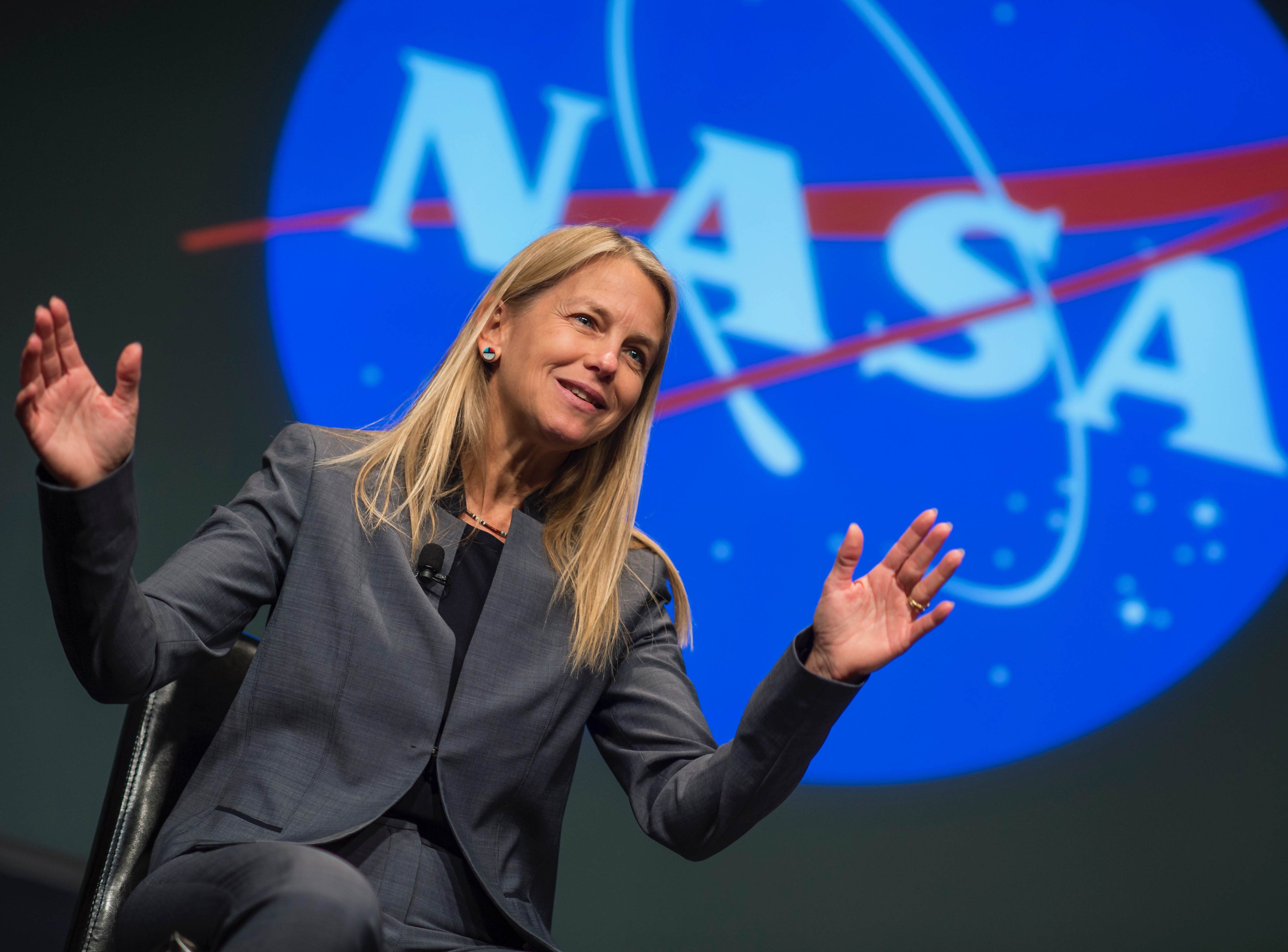 Featured image: Dr. Dava Newman sits in front of the NASA logo. - Read full post: The World's Smallest Spaceship