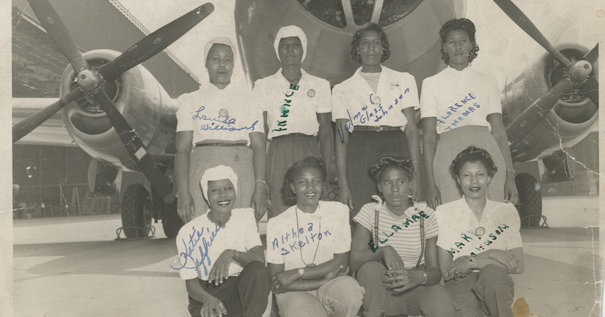 Featured image: Group of Black female Boeing factory workers in front of a WWII bomber - Read full post: WWII Labor Migration